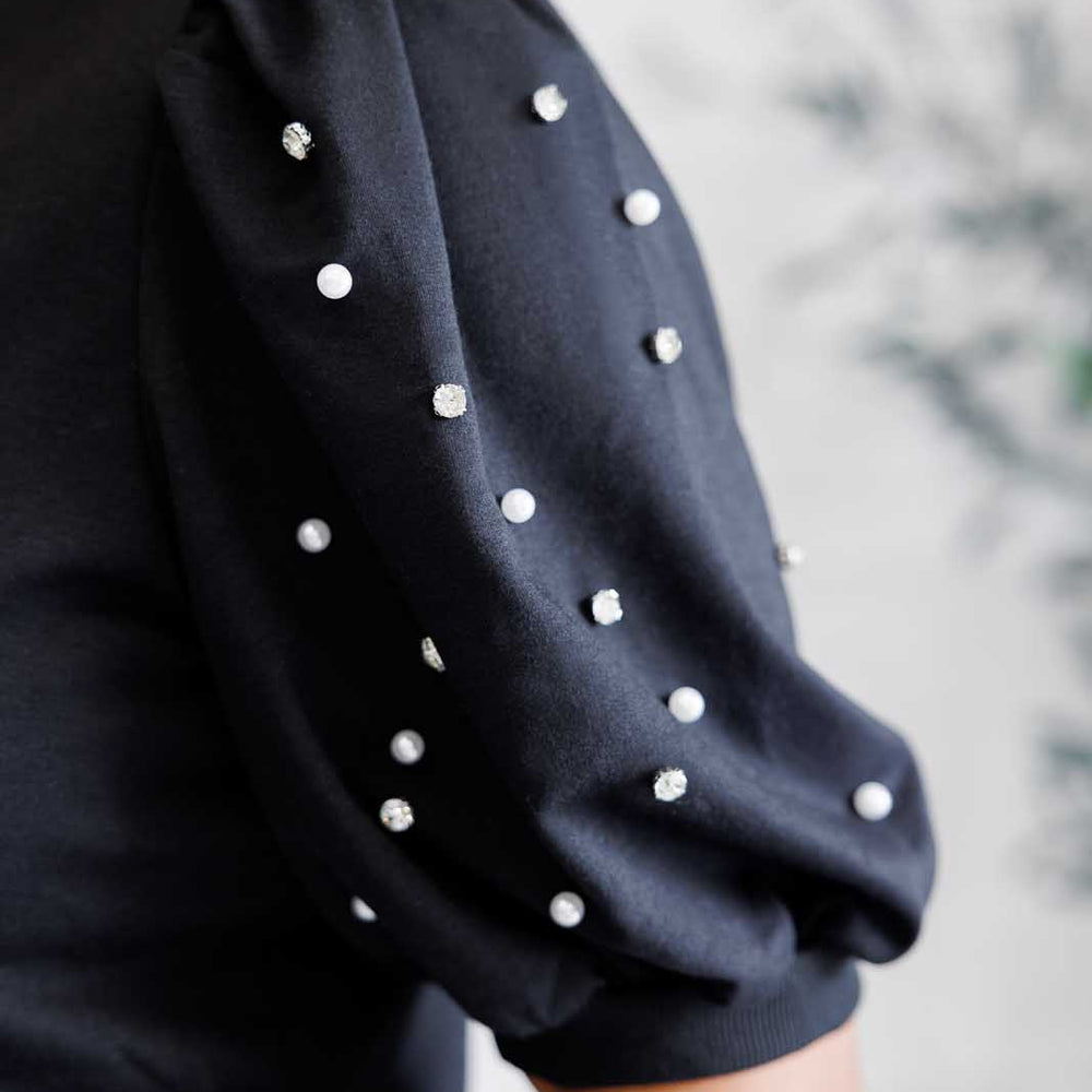 
                      
                        Diamonds and Pearls Puff Sleeve Top in Black
                      
                    