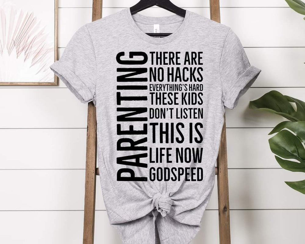 
                      
                        Parenting There Are No Hacks Graphic Tee
                      
                    