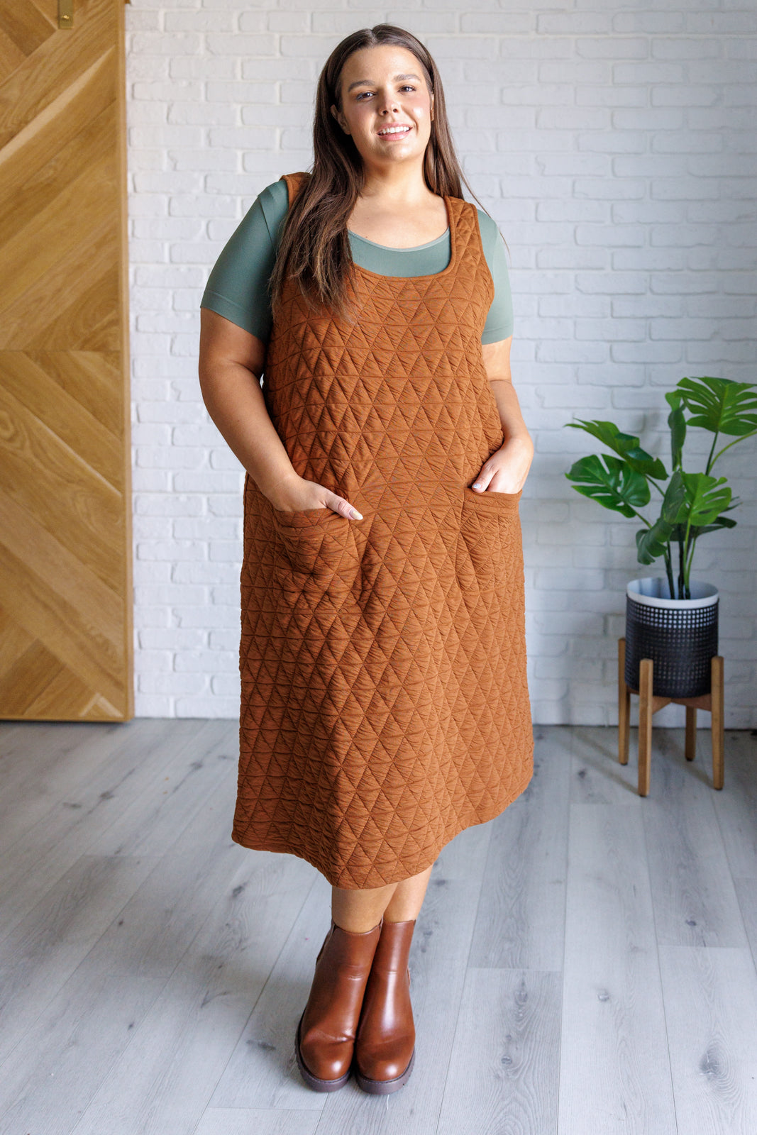 Quilted midi dress with scoop neck, patch pockets, jumper silhouette