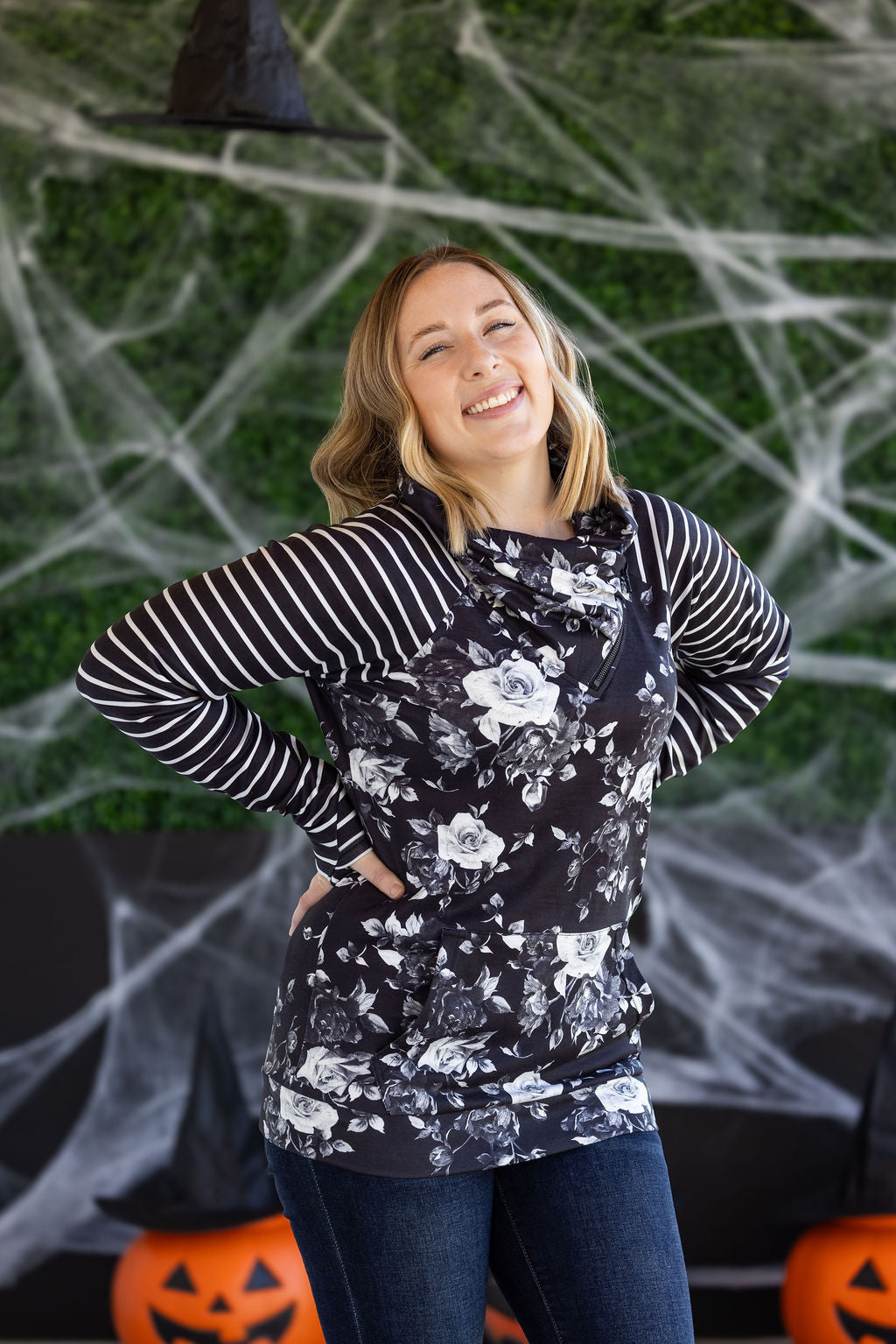 Zoey ZipCowl Sweatshirt in Black Floral and Stripes with bold floral design and striped sleeves