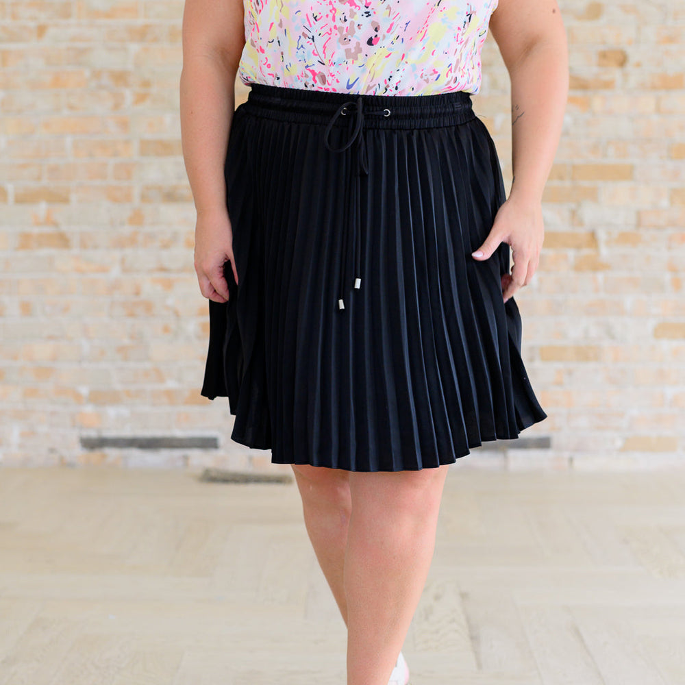 
                      
                        Just a Flirt Pleated Skirt in Black
                      
                    