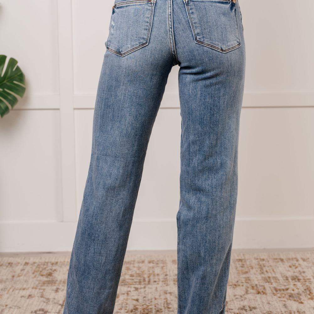 
                      
                        Quinn Mid Rise Cell Phone Pocket Dad Jeans
                      
                    