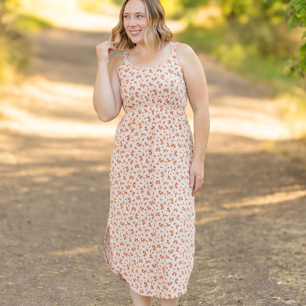 
                      
                        Reagan Ribbed Midi Dress - Sand and Rust Floral
                      
                    