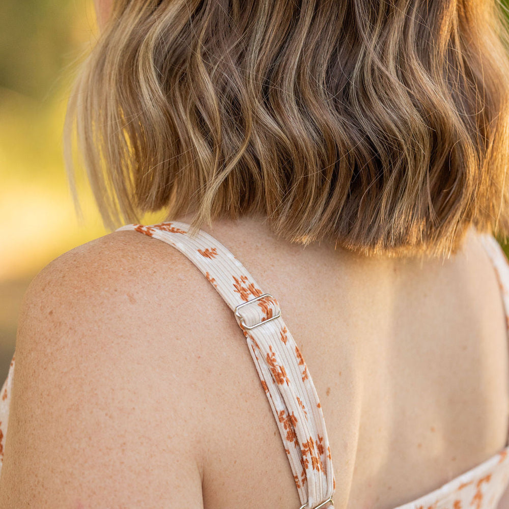 
                      
                        Reagan Ribbed Midi Dress - Sand and Rust Floral
                      
                    