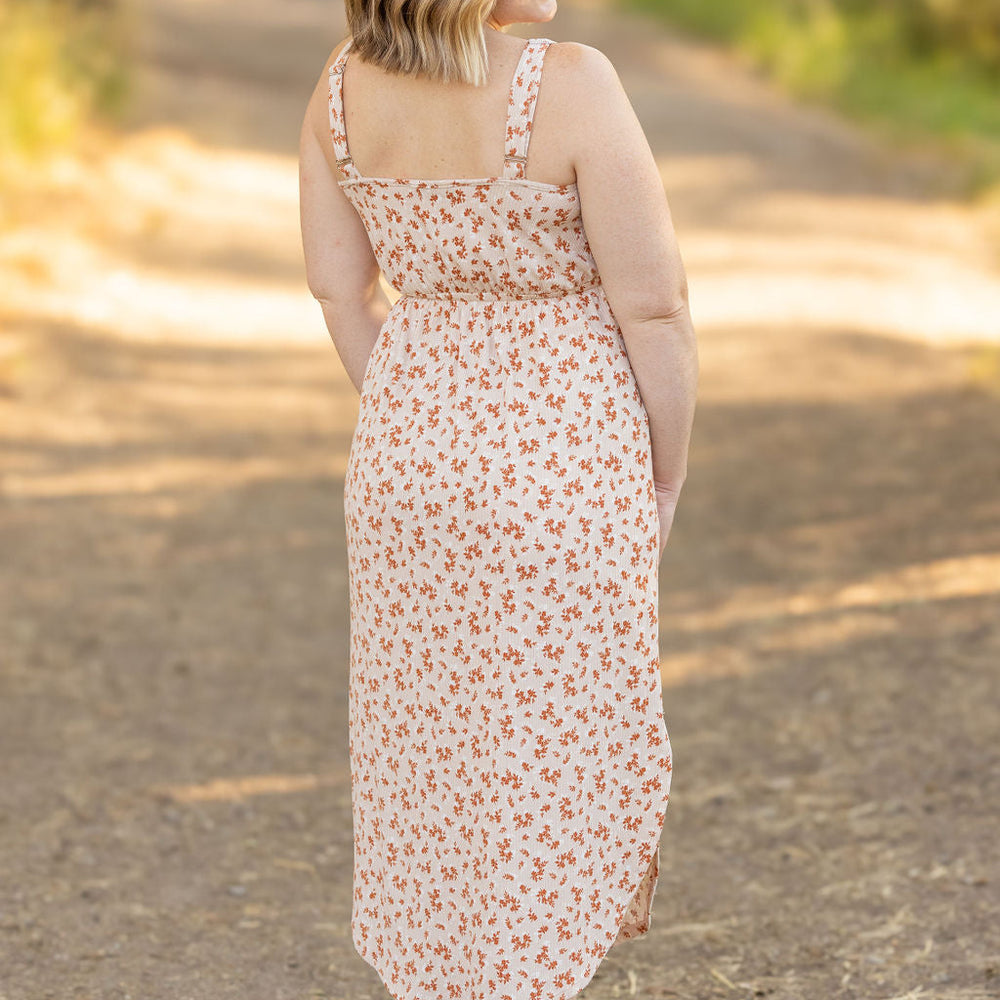 
                      
                        Reagan Ribbed Midi Dress - Sand and Rust Floral
                      
                    