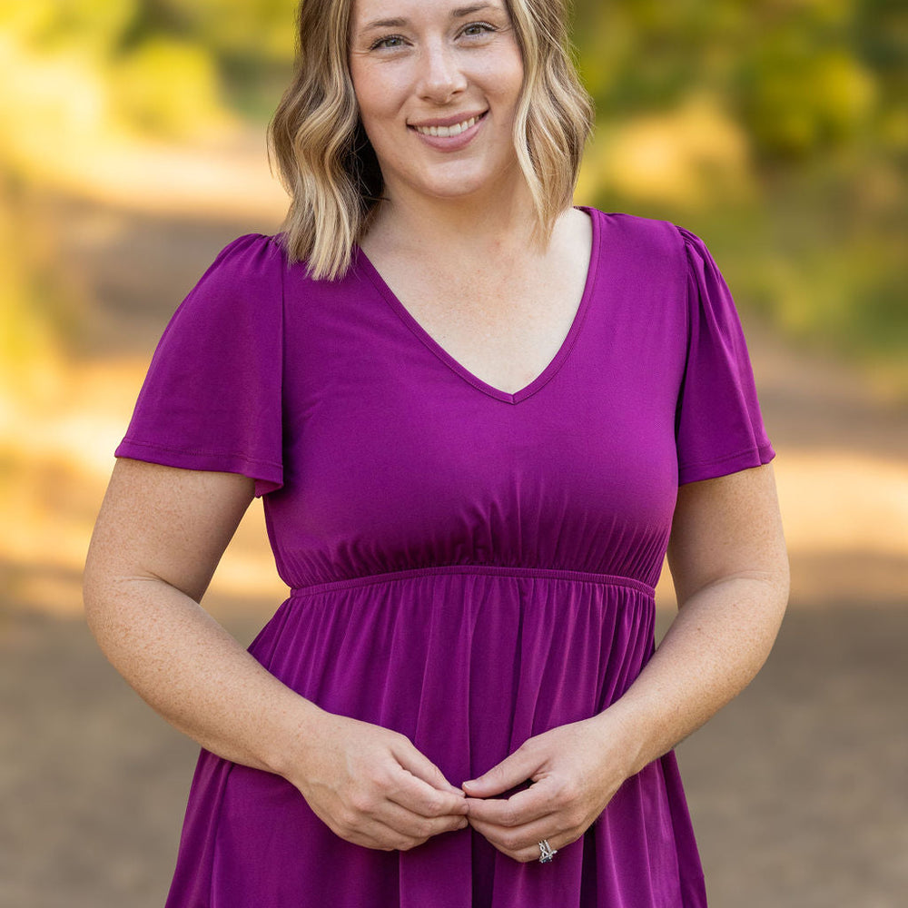 
                      
                        Emery Ruffle Top - Purple
                      
                    