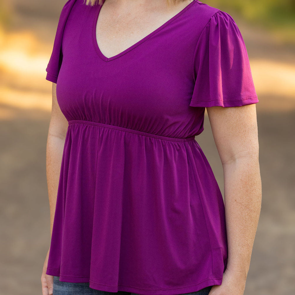 
                      
                        Emery Ruffle Top - Purple
                      
                    