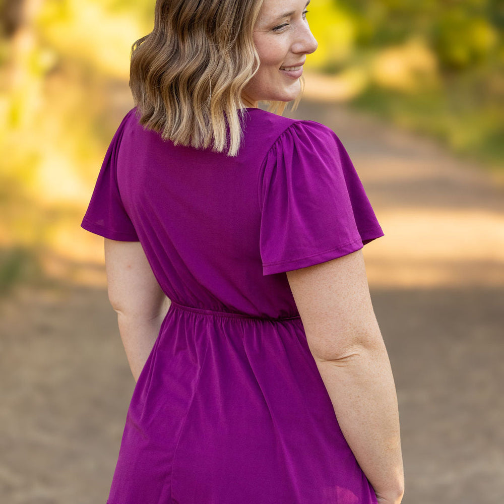 
                      
                        Emery Ruffle Top - Purple
                      
                    