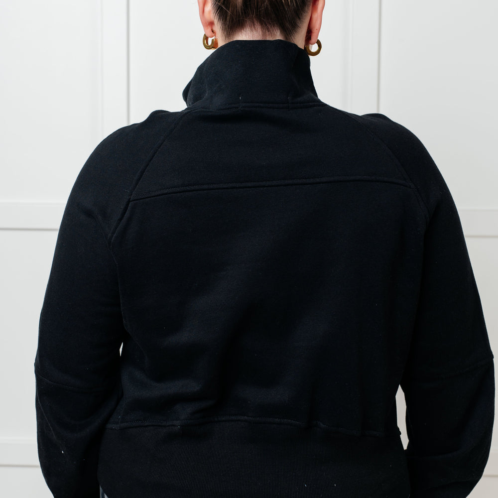 
                      
                        Under Her Spell Half Zip Pullover in Black
                      
                    