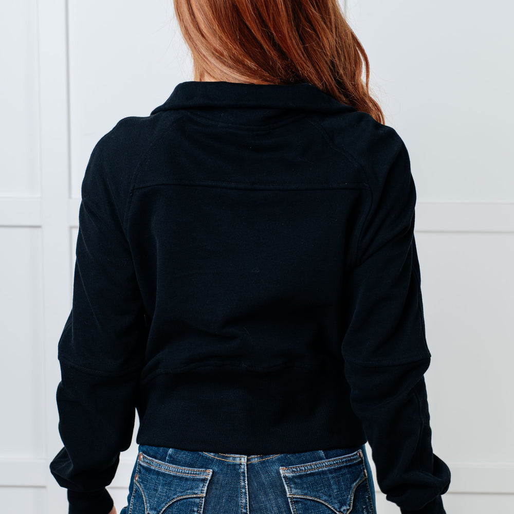 
                      
                        Under Her Spell Half Zip Pullover in Black
                      
                    