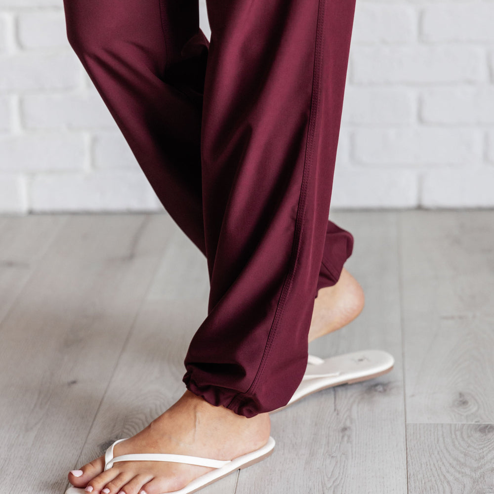 
                      
                        Runner's High Drawstring Joggers in Red Merlot
                      
                    