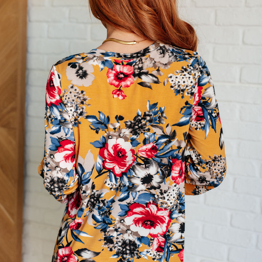 
                      
                        V-Neck Scoop Hem Top in Marigold Floral
                      
                    