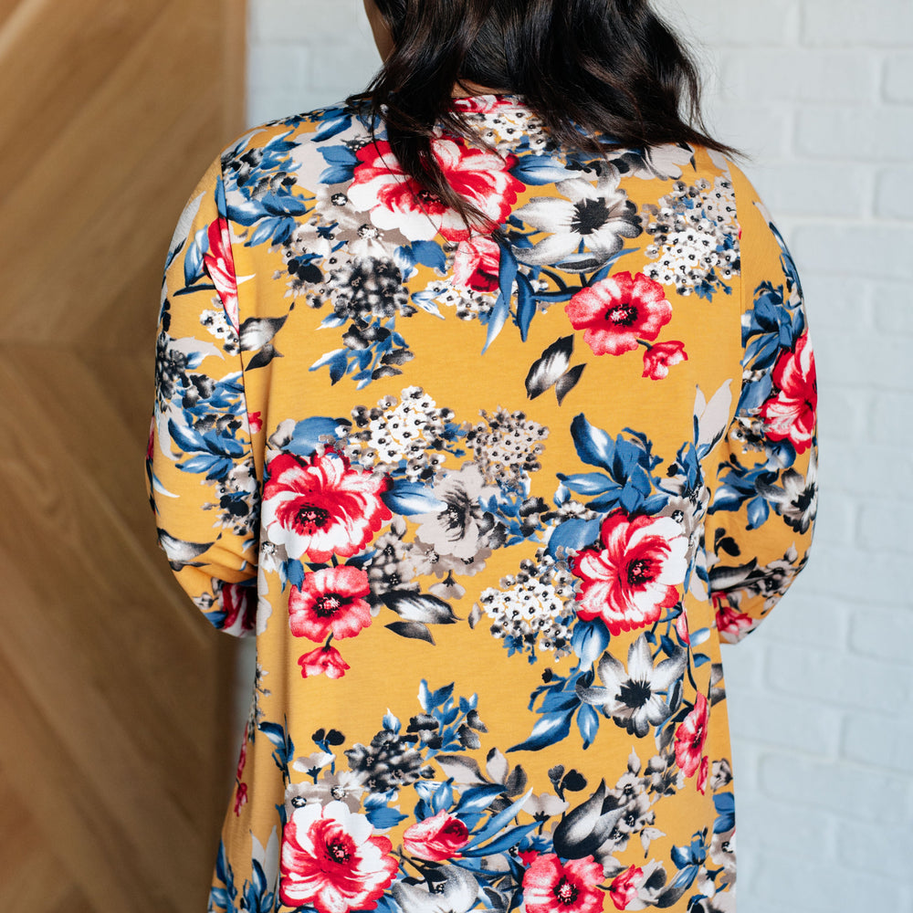 
                      
                        V-Neck Scoop Hem Top in Marigold Floral
                      
                    