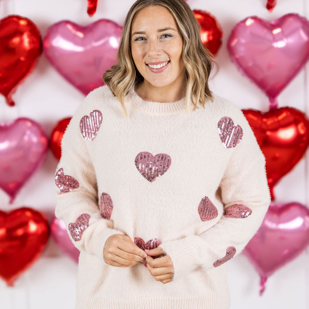 
                      
                        Sparkle Hearts Sweater
                      
                    