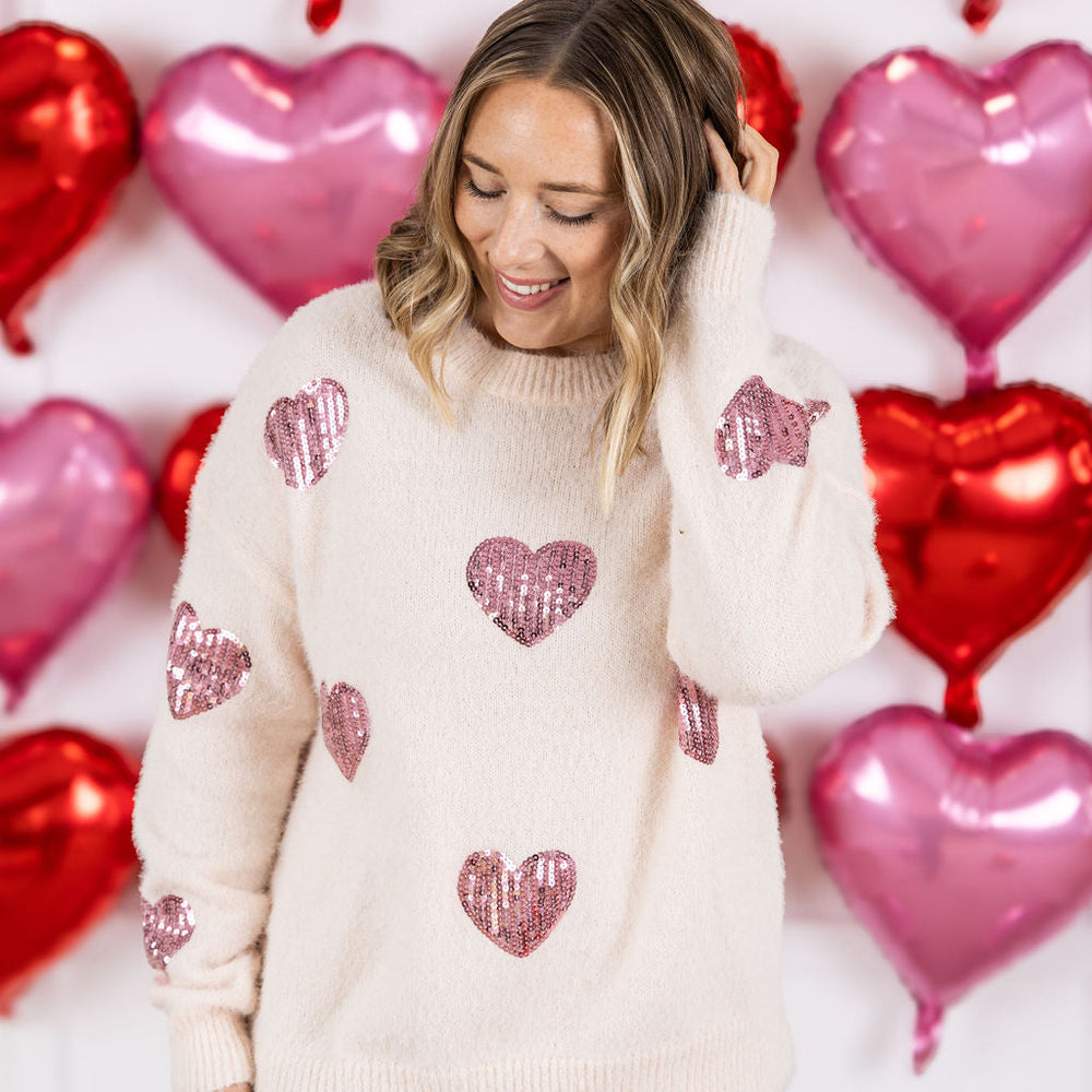 
                      
                        Sparkle Hearts Sweater
                      
                    