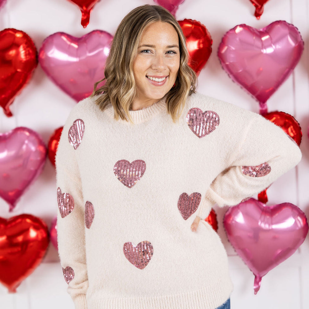 
                      
                        Sparkle Hearts Sweater
                      
                    