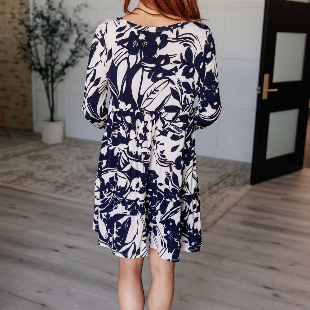 
                      
                        Worthwhile Moment Floral Tiered Dress in Oatmeal and Navy
                      
                    