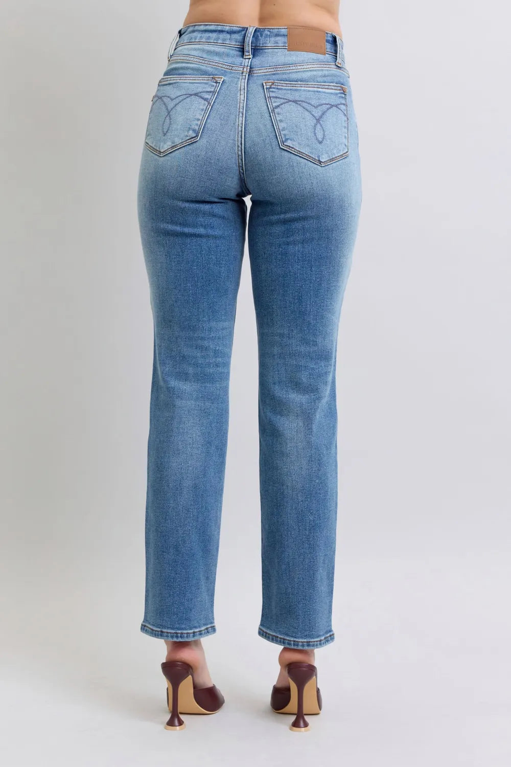 Woman wearing Hadley light wash vintage thermal straight leg jeans with mid-rise fit and full length
