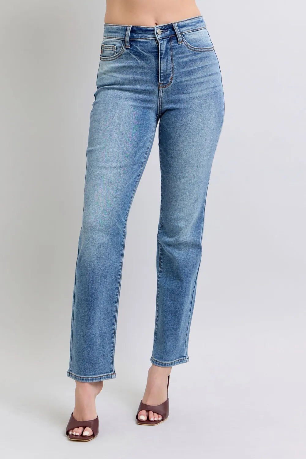 Woman wearing Hadley light wash vintage thermal straight leg jeans with mid-rise fit and full length