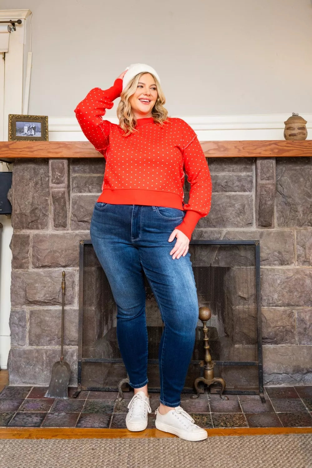 Woman wearing Tessa medium wash thermal skinny jeans with mid-rise fit and ankle length