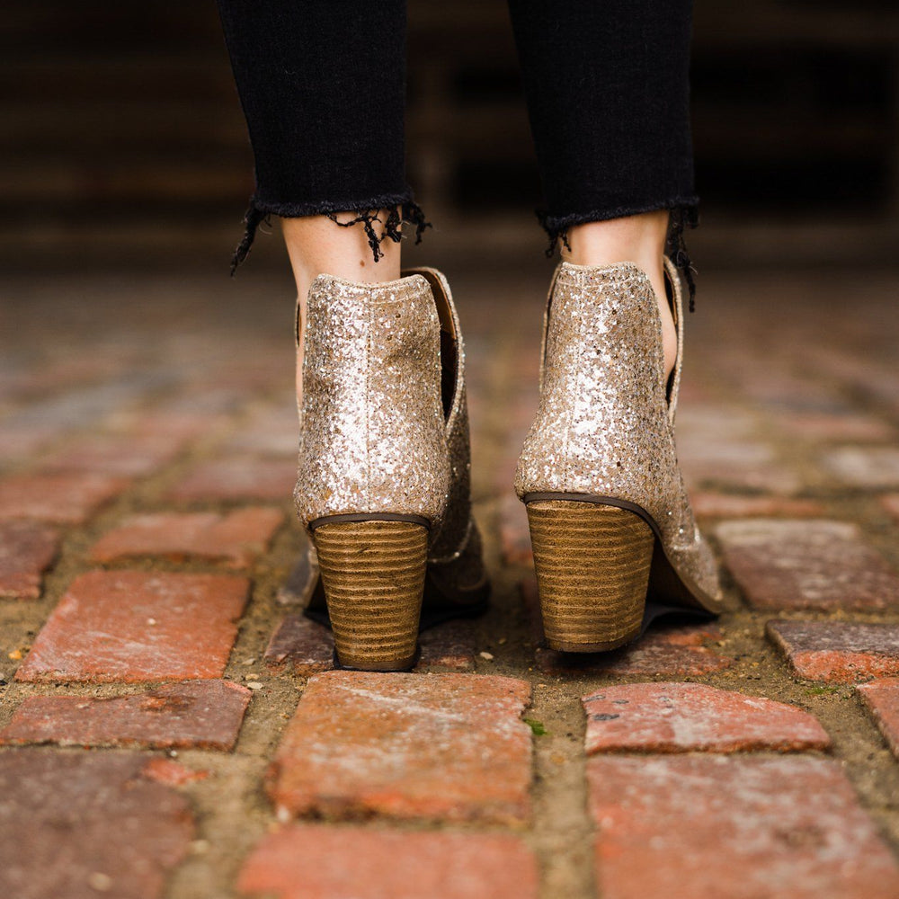 
                      
                        Fiera Booties in Gold
                      
                    