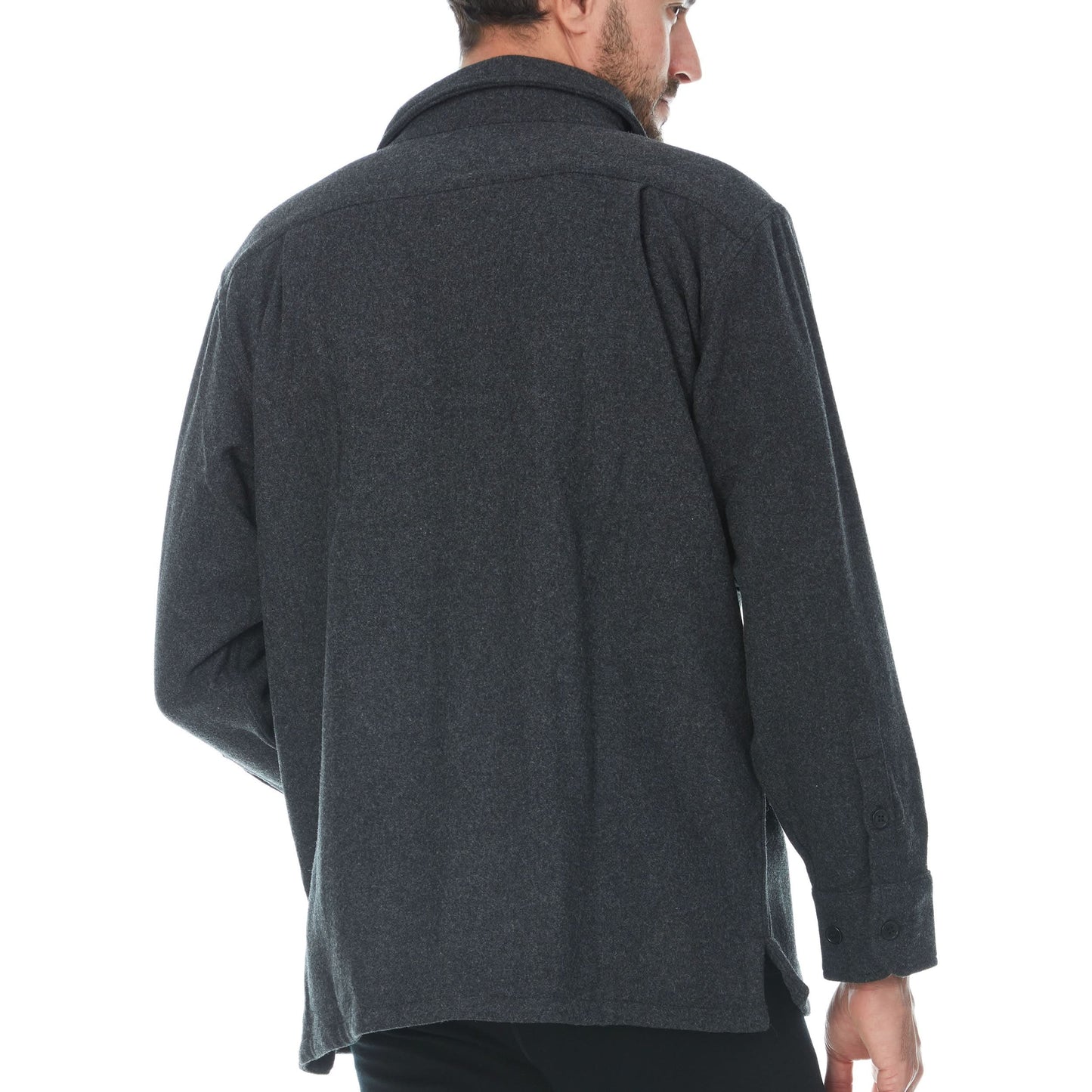 Man wearing a dark gray shirt on a white background