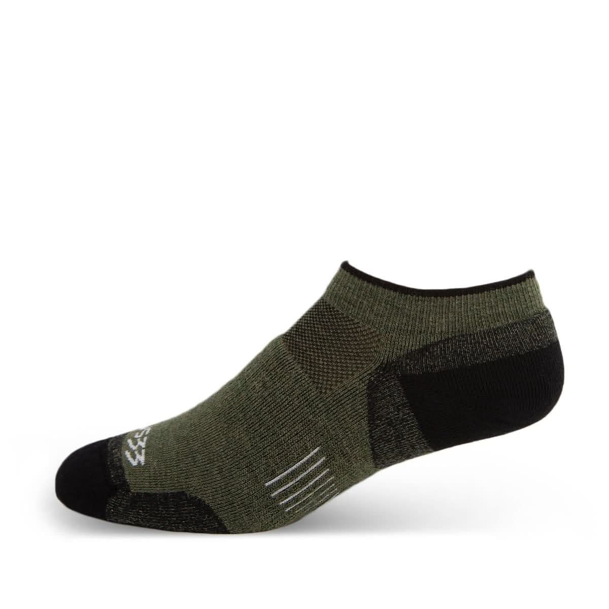 Green ankle sock with black toes and heel on a white background