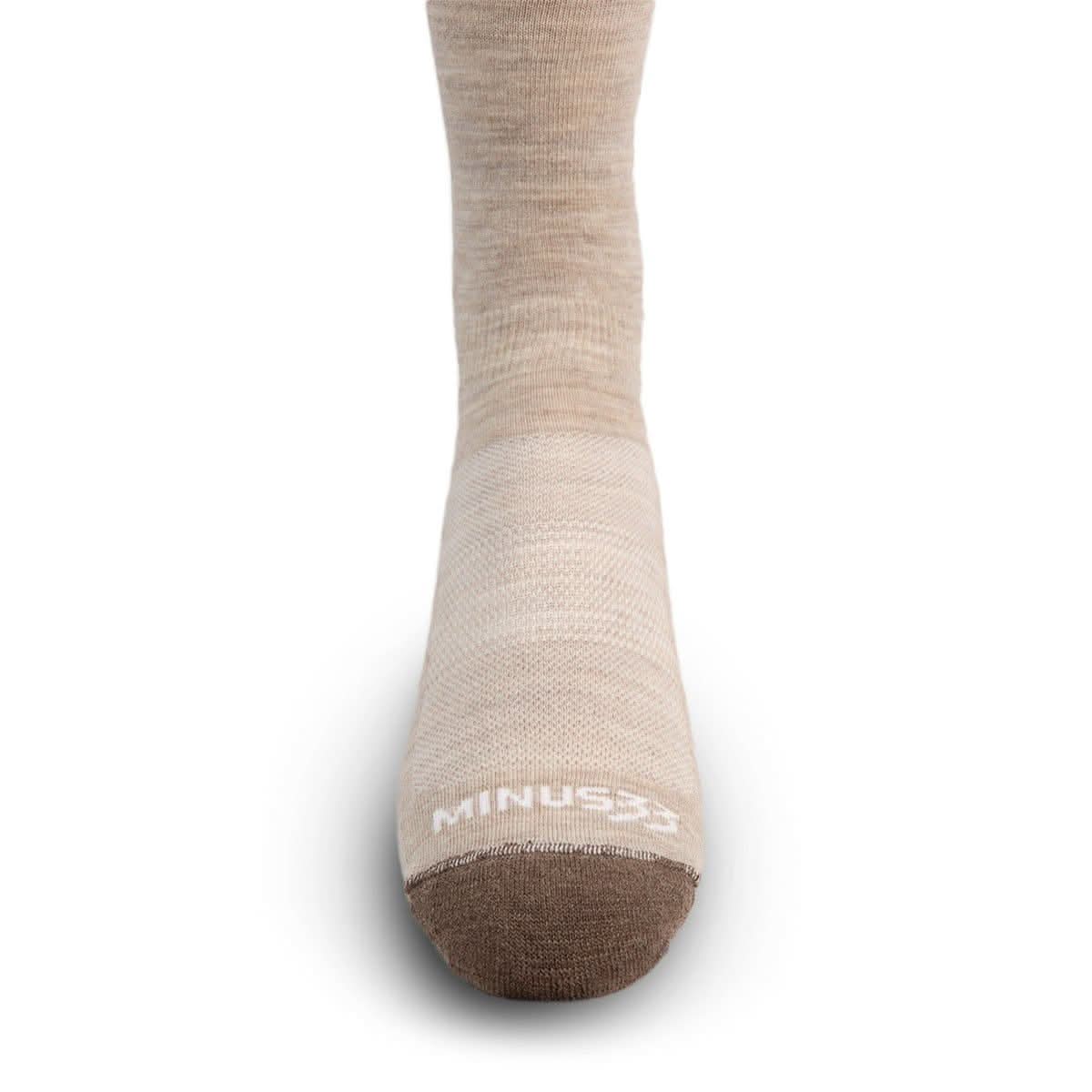 Light beige full-length wool liner sock with reinforced heel and seamless toe