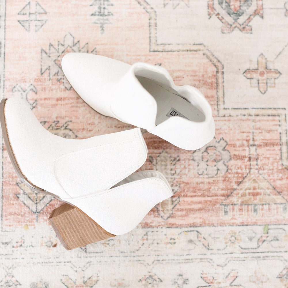 
                      
                        Fiera Booties in White
                      
                    