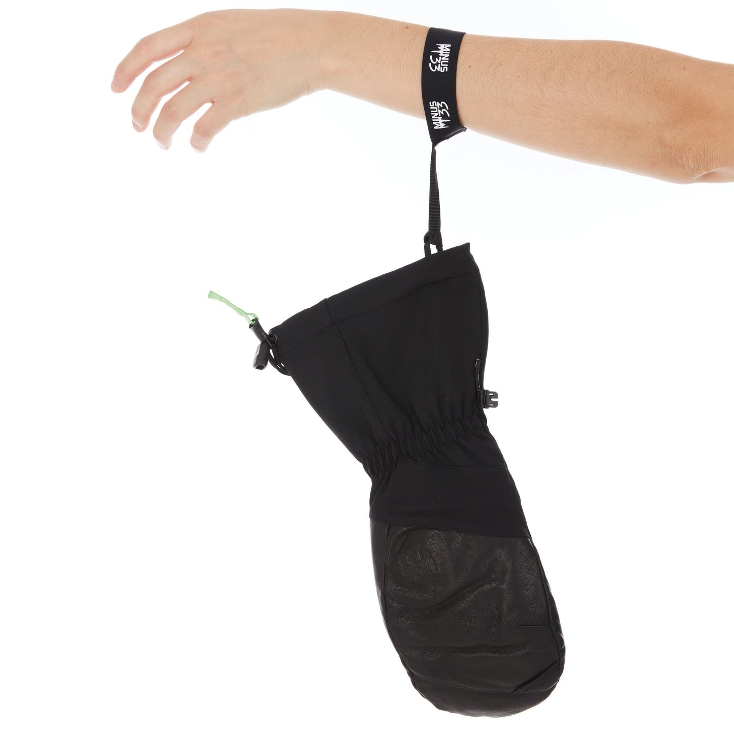 Black waterproof wool ski mittens with leather palms and cinch straps