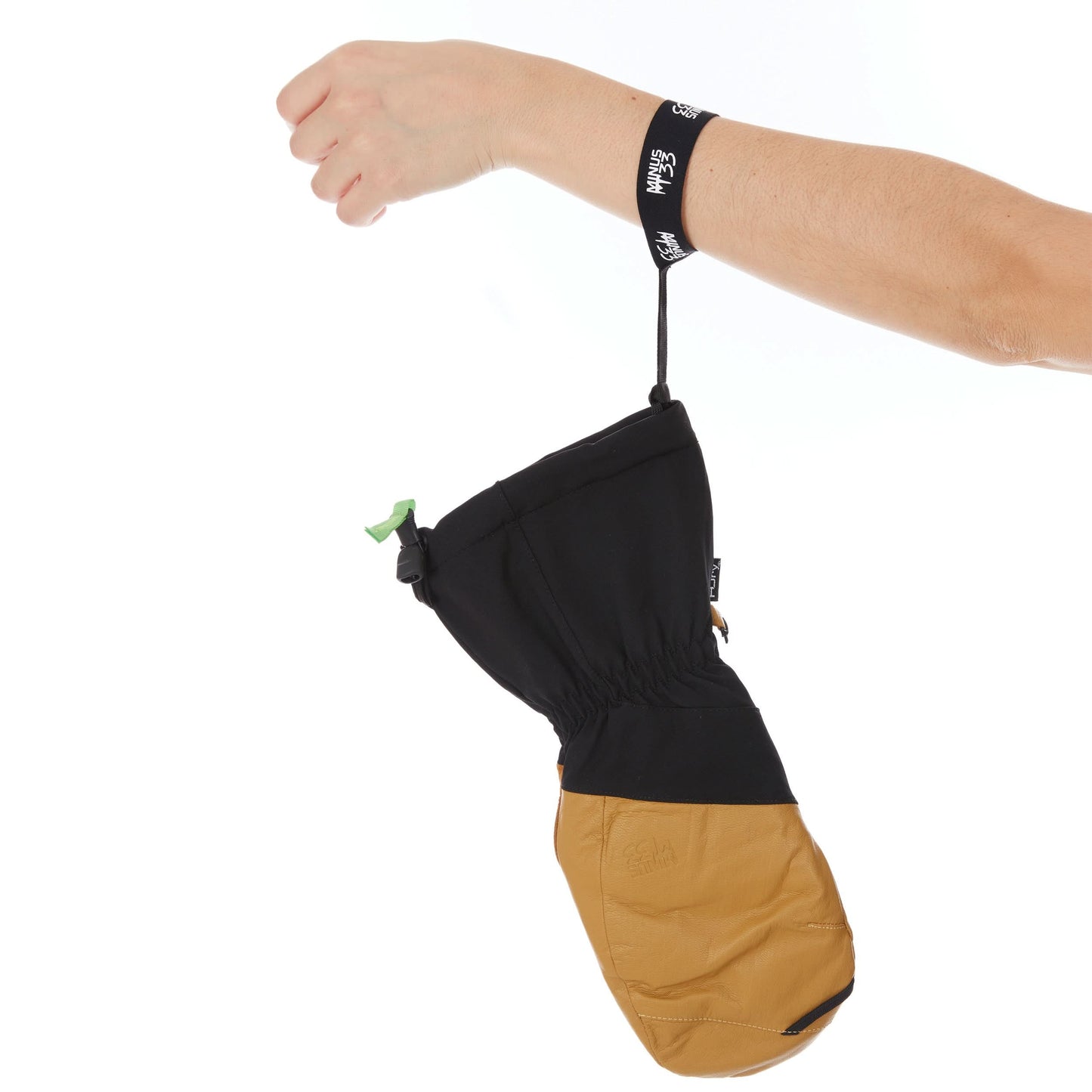 Black waterproof wool ski mittens with leather palms and cinch straps