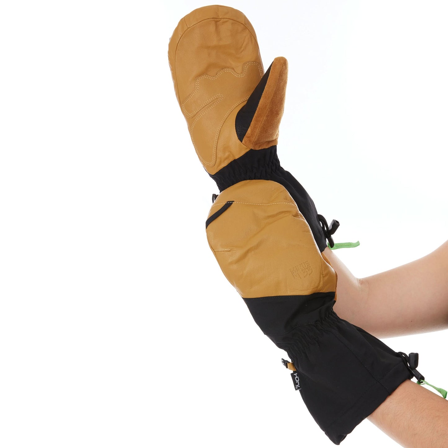 Black waterproof wool ski mittens with leather palms and cinch straps
