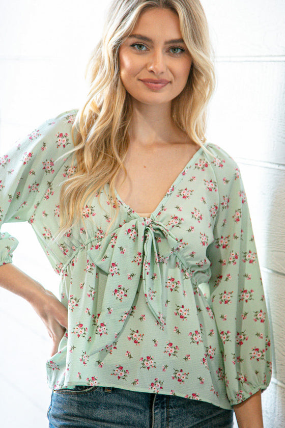 mint crepe seersucker floral knotted woven blouse