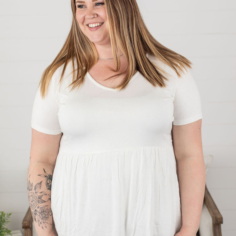 
                  
                    sarah ruffle top - ivory
                  
                