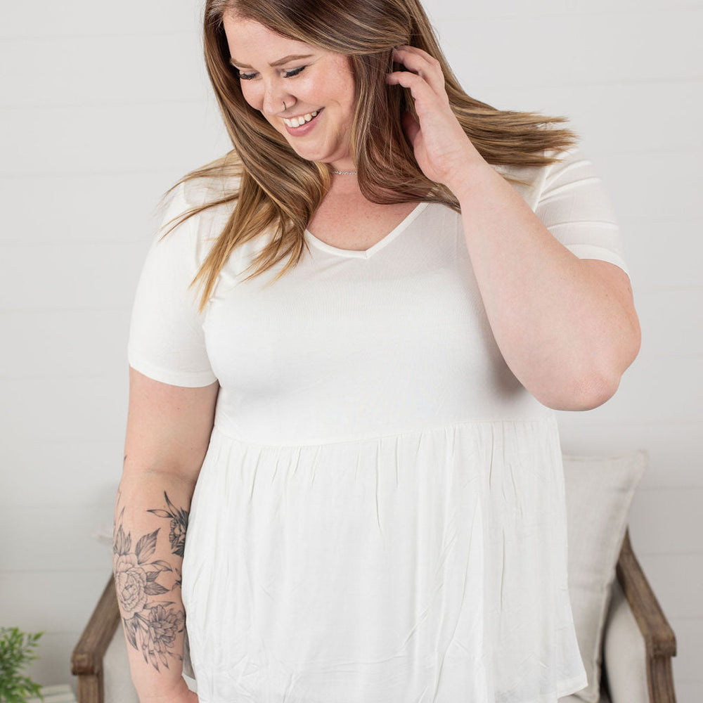 
                  
                    sarah ruffle top - ivory
                  
                