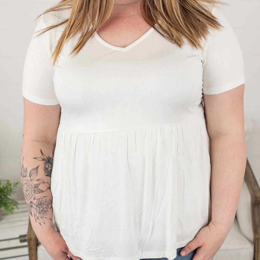 
                  
                    sarah ruffle top - ivory
                  
                